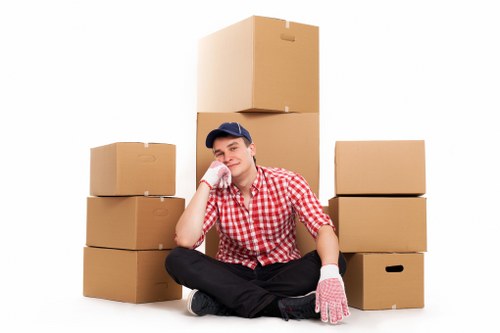 Worker using safe handling practices in a storage facility